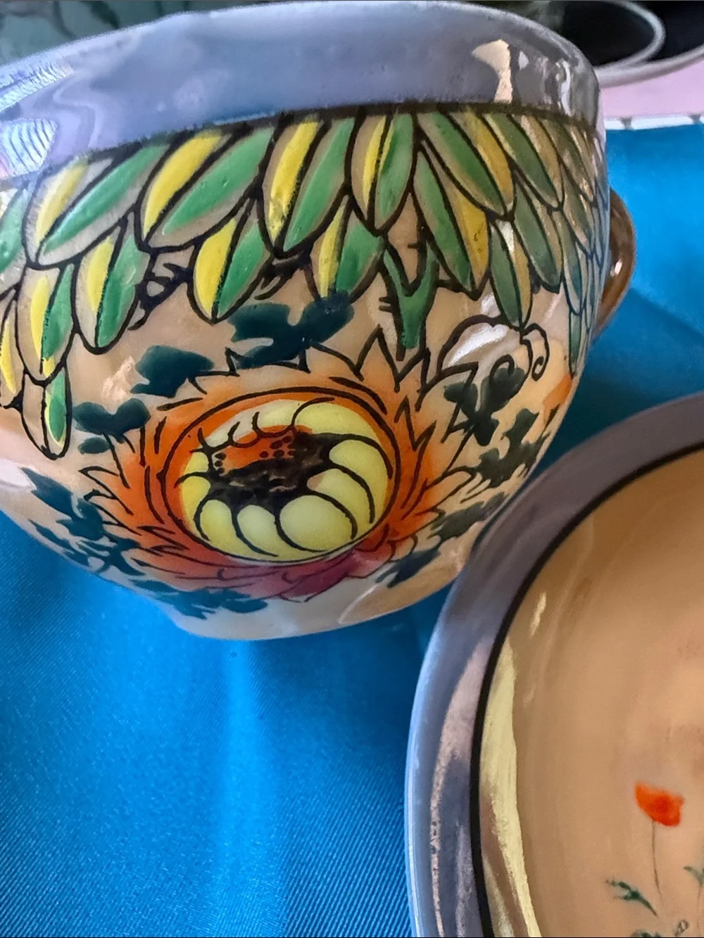 Vintage ca 1940-50’s  made in Japan orange flower lusterware tea cup & saucer